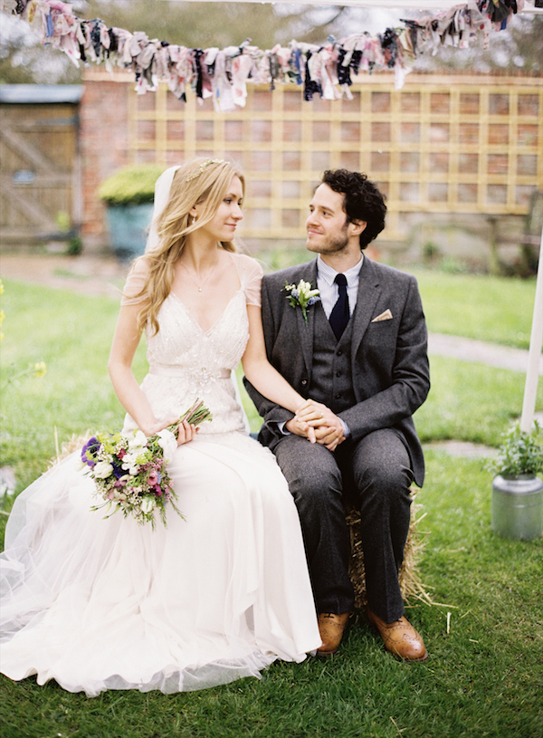 Happy, stylish couple at outdoor garden wedding location - photo by Aneta MAK